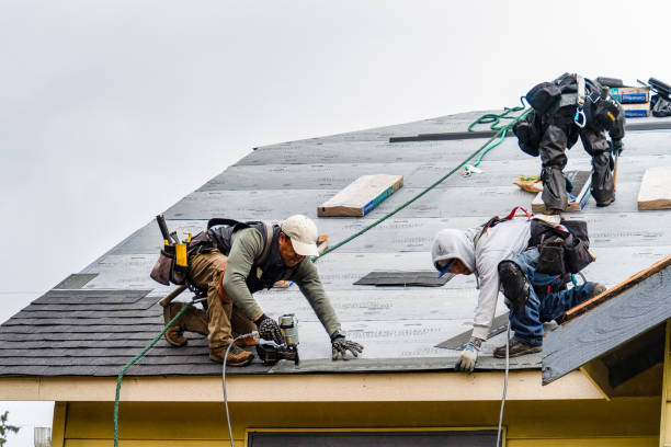 Professional Roofing technician working in Howard, CO